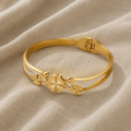 Feiner Kleeblatt-Armreif in Goldfarbe