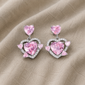 Anmutige rosa Anhängerohrringe